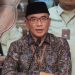 Ketua KPU RI Hasyim Asy'ari saat melakukan rapat pleno terkait undian nomor Paslon Capres dan Cawapres beberapa waktu lalu. (Dok KPU RI)