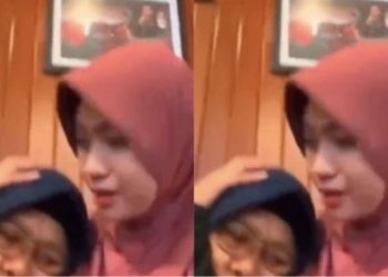 Tangkapan layar video yang sempat viral seorang ibu meninggal dipelukan anaknya. (dok. @user00012345629)