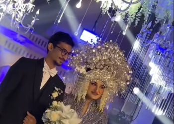 Tangkapan layar dua mempelai pengantin dalam video pernikahan viral. (dok. Panduga)
