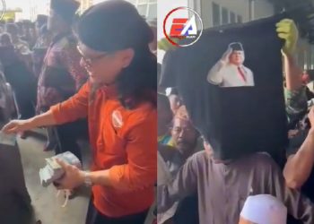 Gus Miftah sedang bagi-bagi uang ke masyarakat di Madura (dok. Tiktok @essenah_alam)